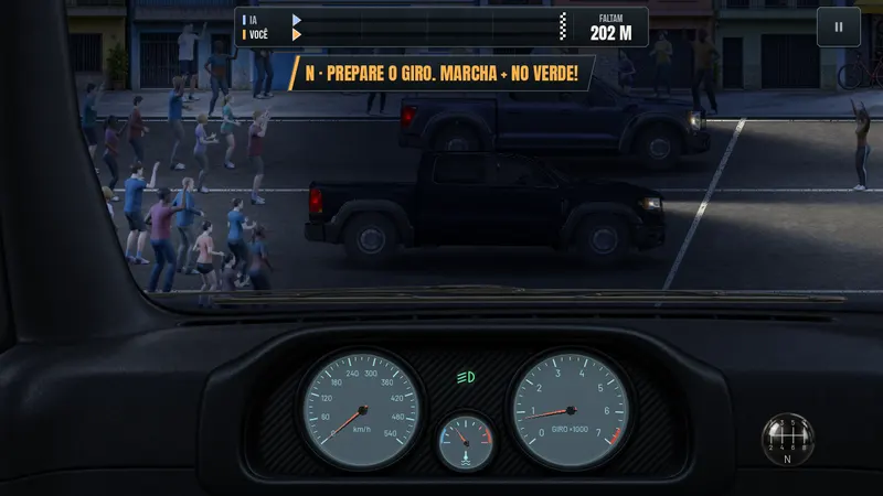 Night start in the neighbourhood: two pickups at the line and the crowd lining the street, seen from the driver's seat.